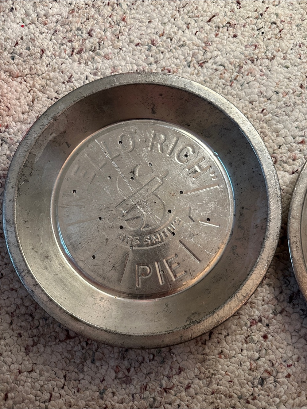 2 vintage Mrs. Smith's Mello-Rich aluminum pie tins.